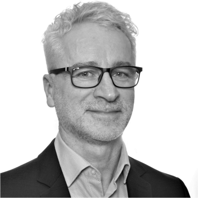 Headshot of Igor Mate, greyscale